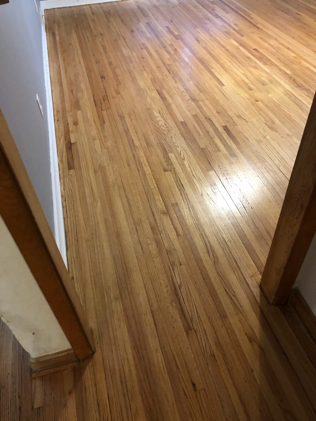 After: natural finish hardwood with excellent shine and consistent grain